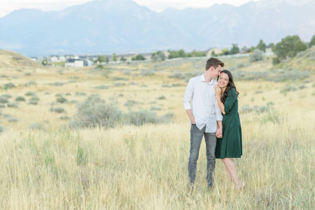 Salt Lake City engaged couple in field