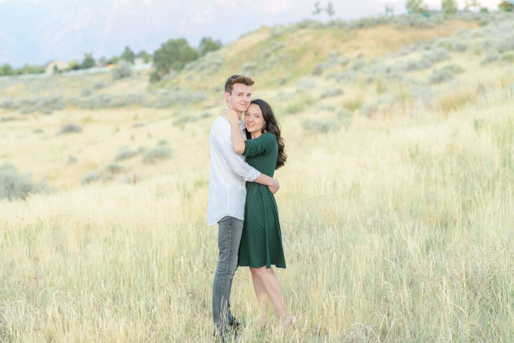 Salt Lake City engaged couple in field