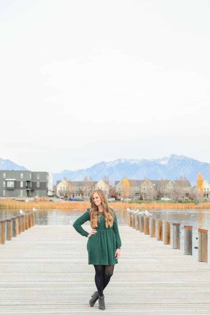 Natural light portrait with calm water in the background