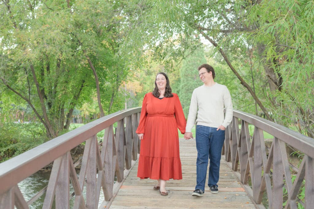 Husband and wife take a quiet moment together during fall family photos in Provo, Utah.
